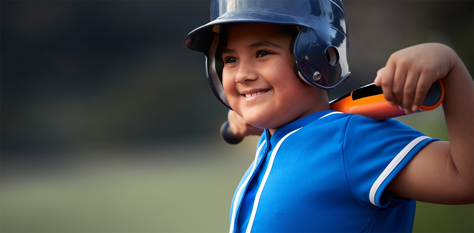 Boy in baseball uniform
